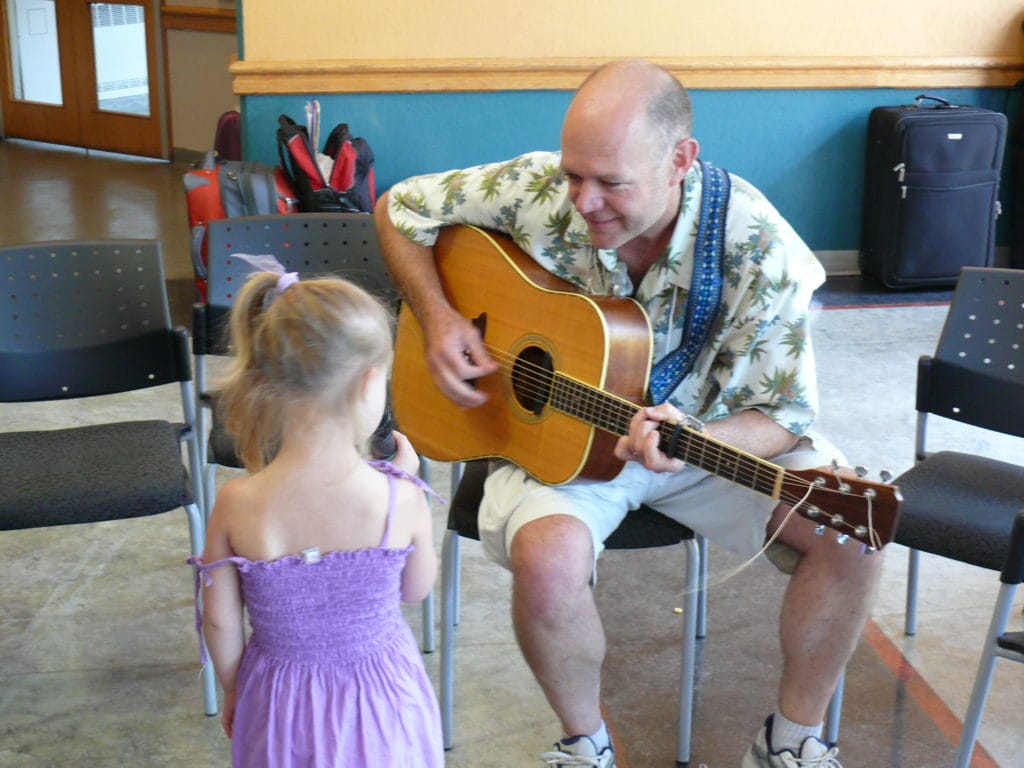 Peter Leidy playing guitar